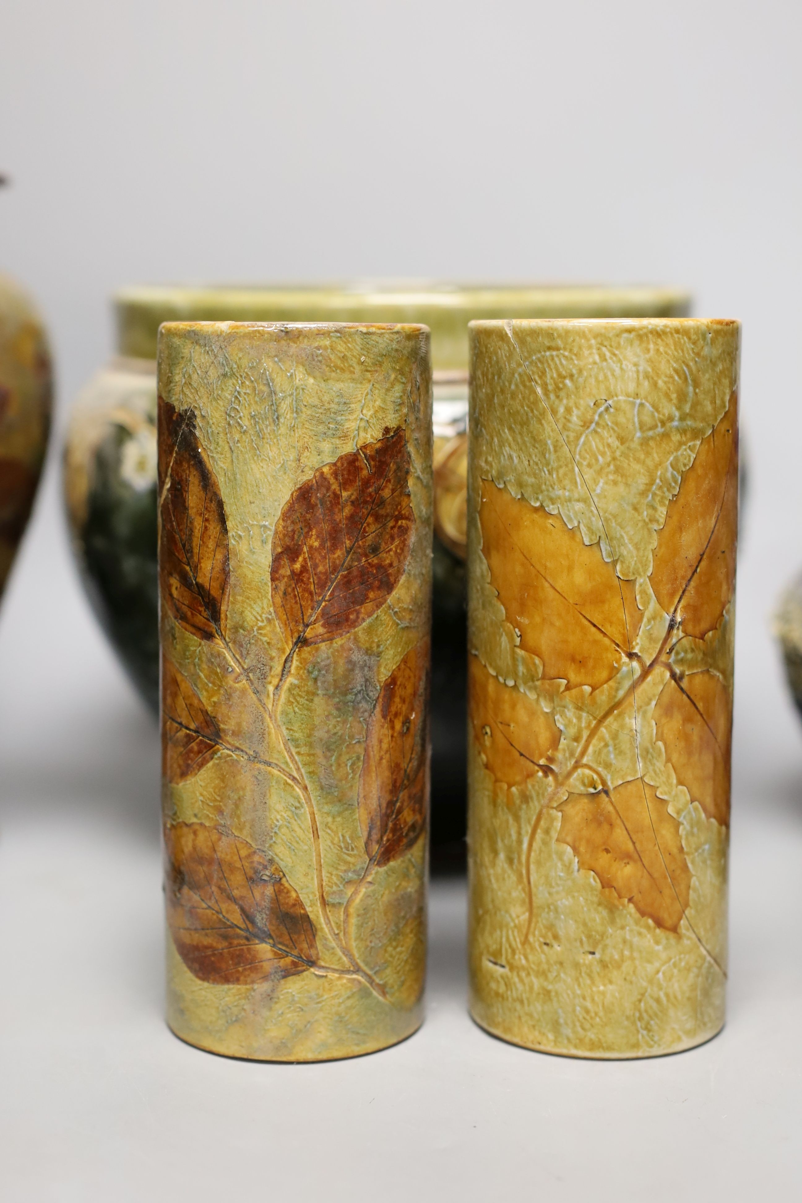 10 pieces of Doulton Lambeth stoneware including a jardiniere, vases etc, largest item jardiniere, 19 cms diameter.